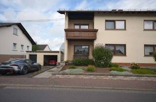 Doppelhaushälfte kaufen in 56244 Ewighausen, Ihr Wohntraum in ruhiger Lage!Modernisierte Doppelhaushälfte mit Garage und Garten.