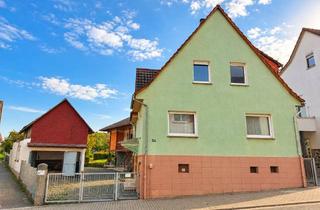 Einfamilienhaus kaufen in Burkhardsfelder Strasse 24, 35447 Reiskirchen, Viel Platz & Potenzial: Einfamilienhaus mit Einliegerwohnung auf großem Grundstück!