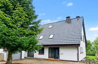 Einfamilienhaus kaufen in 25879 Süderstapel, Wohnen mit Wasserblick - bezugsfertiges Einfamilienhaus zu verkaufen in Stapel