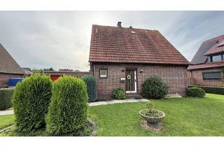 Einfamilienhaus kaufen in 26388 Fedderwarden, Gemütliches Einfamilienhaus mit Garage und großem Grundstück in Fedderwarden