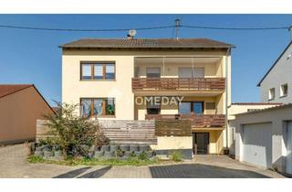 Anlageobjekt in 86456 Gablingen, Voll vermietet: Mehrfamilienhaus mit 3 Wohneinheiten und Garagen