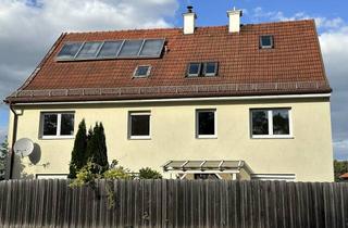 Wohnung kaufen in 84543 Winhöring, Wohnung mit umfangreichem Platzangebot und zwei Garagen