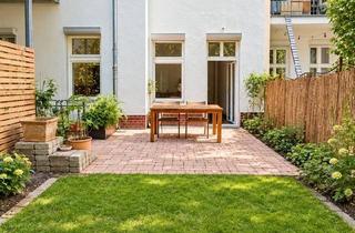 Wohnung kaufen in 12045 Berlin, Berlin - Charmante 2-Zimmer-Altbauwohnung mit privatem Garten im Weserkiez