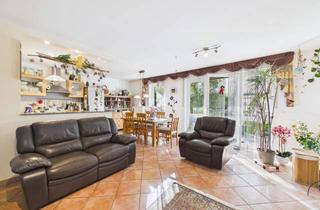Wohnung kaufen in 85540 Haar, Charmante Erdgeschosswohnung mit eigenem Garten und Terrasse