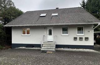 Wohnung kaufen in 63571 Gelnhausen, Komfortable 4 Zimmer Erdgeschoss Wohnung mit Garten, Balkon, Kamin und Doppelcarport
