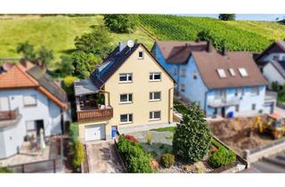 Mehrfamilienhaus kaufen in 97288 Theilheim, Solides Mehrfamilienhaus mit drei Wohneinheiten auf großzügigem Grundstück