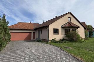 Einfamilienhaus kaufen in 74599 Wallhausen, Kleines Einfamilienhaus mit Doppelgarage und schönem Grundstück in ruhiger Siedlungslage