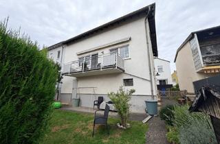 Einfamilienhaus kaufen in 61169 Friedberg (Hessen), Friedberg-Dorheim: Familienfreundliches Einfamilienhaus mit Wintergarten, Balkon und Garten