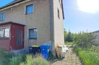 Doppelhaushälfte kaufen in Frauensteiner Straße 82, 09599 Freiberg, Vollsanierungsbedürftige Doppelhaushälfte mit Garten und Potenzial in Freiberg zu verkaufen!