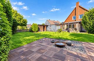 Haus kaufen in 59439 Holzwickede, Ein Zuhause mit Charakter - Kamin, Wintergarten und ca. 950 m² Grundstück.