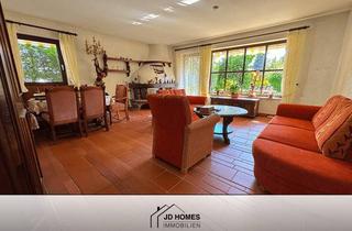Wohnung kaufen in 82467 Garmisch-Partenkirchen, Charmante Erdgeschosswohnung mit Rundum-Terrasse und großem Gestaltungspotenzial
