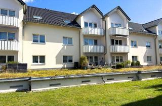 Wohnung kaufen in 09376 Oelsnitz, Vermietete 3-Zimmer-Eigentumswohnung mit Terrasse und Tiefgaragenstellplatz