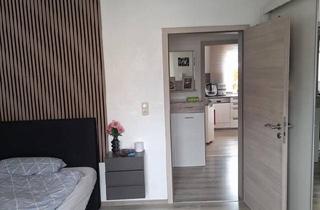 Wohnung kaufen in 87719 Mindelheim, Mindelheim - Schöne, helle 3-Zim.-Wohnung mit eigenem Garten