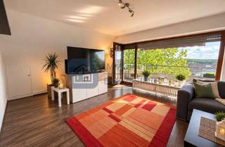 Wohnung kaufen in 51381 Quettingen, Zentral gelegene 2-Zimmer-Wohnung mit Balkon, Weitblick bis zum Kölner Dom & Garage