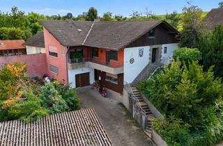 Einfamilienhaus kaufen in 55270 Bubenheim, Einfamilienhaus mit Einliegerwohnung in ruhiger Wohnlage – Loggia mit Weitblick, Garten und Garage