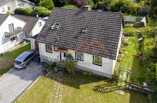 Einfamilienhaus kaufen in 58706 Menden, Ruhig wohnen im Grünen – Einfamilienhaus mit viel Potenzial in Menden-Lahrfeld