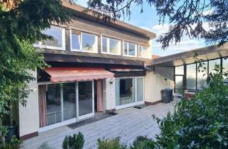 Einfamilienhaus kaufen in 71229 Leonberg, Familienfreundliches Einfamilienhaus mit Einliegerwohnung in attraktiver Aussichtslage von Leonberg