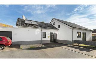 Haus kaufen in 59192 Bergkamen, Architektonische Eleganz im Erbbaurecht:: Großzügiges EFH mit Galerie und Doppelgarage in Rünthe