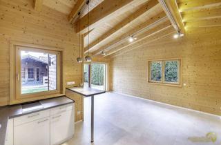 Haus kaufen in 84092 Bayerbach, Attraktiver KFW40-Holzmassivbungalow mit 2 Zimmern, PV, Garten, Stellplatz und moderner Ausstattung