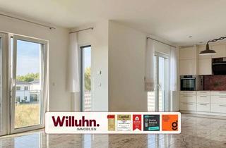 Wohnung kaufen in 06774 Pouch, Neubau-Ferienwohnung am See | Balkon mit Seeblick | Einbauküche inkl. | Energieeffizienzklasse Ax