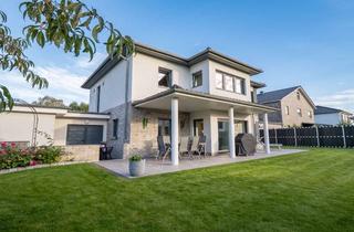 Villa kaufen in 38448 Wendschott, Moderne KfW-70-Stadtvilla, 173m² Wfl., 7 Zimmer, mit Wellnessbereich, Garten, PV, Doppelgarage