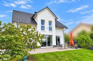 Einfamilienhaus kaufen in 64832 Babenhausen, Freistehendes EinfamilienhausFamilientraum am FeldrandWärmepumpe, Einbauküche, PV-Anlage, Garage
