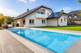 Einfamilienhaus kaufen in 59457 Werl, / Wohnen mit Urlaubsfeeling – Einfamilienhaus mit großzügigem Garten und beheiztem Außenpool