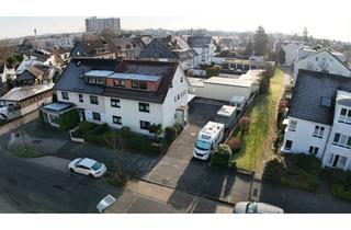 Mehrfamilienhaus kaufen in 40724 Hilden, Vollvermietetes Mehrfamilienhaus mit 3 Wohneinheiten, Garagen & Lagerhallen in zentraler Lage