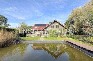 Einfamilienhaus kaufen in 26388 Sengwarden, Einfamilienhaus in Sengwarden: Wohnidylle mit Schwimmteich & PV-Anlage
