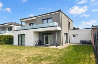 Wohnung kaufen in 38448 Wendschott, Modernes Wohnen im Bauhausstil-mit Garten und überdachter Terrasse
