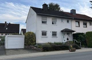 Doppelhaushälfte kaufen in 61381 Friedrichsdorf, Solide Doppelhaushälfte mit viel Potenzial in ruhiger Friedrichsdorfer Lage nähe Hardtwald
