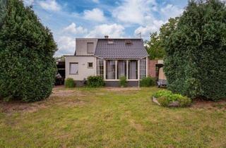 Einfamilienhaus kaufen in 46446 Emmerich, Emmerich: Einfamilienhaus mit Wintergarten, Carport und liebevoll angelegtem Garten