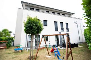 Wohnung kaufen in 61440 Oberursel, Moderne 3 Zimmerwohnung mit eigenem Garten/Terasse/2 Bädern u.TG-Stellplatz in Toplage von Oberursel