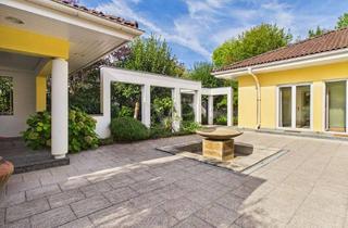 Haus kaufen in 63785 Obernburg, Großzügiger Bungalow in Feldrandlage mit exklusiv gestaltetem Außenbereich