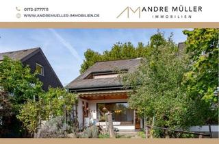 Haus kaufen in 55270 Klein-Winternheim, Traumgarten inklusive: 1-2 Familienhaus auf 747 m² Grundstück in Klein-Winternheim