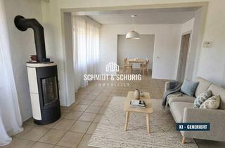 Wohnung kaufen in 76703 Kraichtal, Großzügige Erdgeschosswohnung mit Garten, Balkon und Kamin in Kraichtal-Bahnbrücken