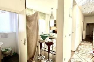 Wohnung kaufen in 68161 Mannheim, Über den Dächern der Mannheimer Quadrate - stilvolle DG im denkmalgeschützten Altbau