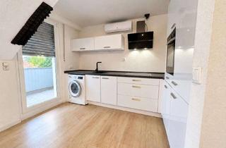 Wohnung kaufen in 48712 Gescher, Charmante 2-Zimmer-Dachgeschosswohnung mit Balkon & neuer Küche