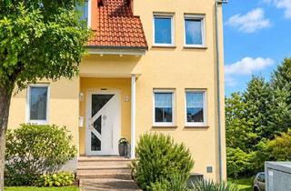 Haus kaufen in Am Nussbaum 10, 54453 Nittel, Gepflegtes Reiheneckhaus mit Moselblick, Garten und Garage – provisionsfrei