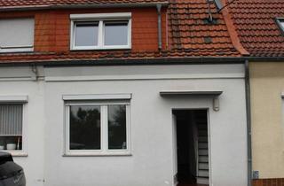 Reihenhaus kaufen in 41836 Hückelhoven, Charmantes Reihenhaus mit Garage und Stellplätzen in Hückelhoven-Ratheim