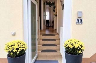 Wohnung kaufen in 55257 Budenheim, Wohnen wie im eigenen Haus! Bungalow mit Pool, Sauna & Garage - Provisionsfrei