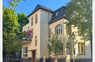 Wohnung kaufen in 61231 Bad Nauheim, Stilvolle Altbauwohnung mit Garten und Terrasse in denkmalgeschützter Jugendstilvilla (saniert)