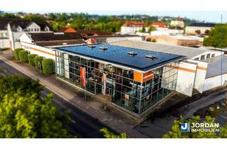Gewerbeimmobilie kaufen in 37269 Eschwege, Repräsentative Gewerbeimmobilie mit Showroom und Lagerflächen