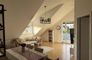 Wohnung kaufen in 63329 Egelsbach, Charmante und lichtdurchflutete Dachgeschosswohnung mit Balkon und Tiefgarage