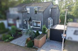 Doppelhaushälfte kaufen in 40723 Hilden, Provisionsfrei -geplegte Doppelhaushälfte mit Einliegerwohnung und Südgarten in ruhiger Spielstraße