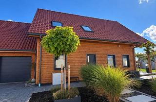 Haus kaufen in Ahornweg 17, 86750 Megesheim, Exklusives Massivstammholzhaus mit 3-fach Garage