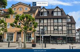 Mehrfamilienhaus kaufen in 37213 Witzenhausen, Mehrfamilienhaus mit drei Balkonen und zwei Ladeneinheiten als Renditeobjekt
