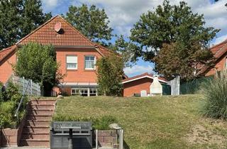 Haus kaufen in Achtert Diek 1a, 26629 Großefehn, Timmel-Grossefehn – DHH / Ferienhaus in Wasserlage