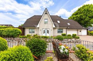 Haus kaufen in 25794 Dörpling, Großzügiges Kapitänshaus mit Doppelgarage und Carport in ruhiger Sackgassenlage
