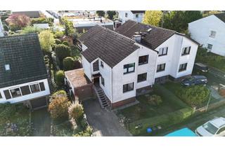 Haus kaufen in 61449 Steinbach, Wohnen, vermieten, Generationen vereinen: Zweifamilien-DHH mit Garten & Garage in Steinbach